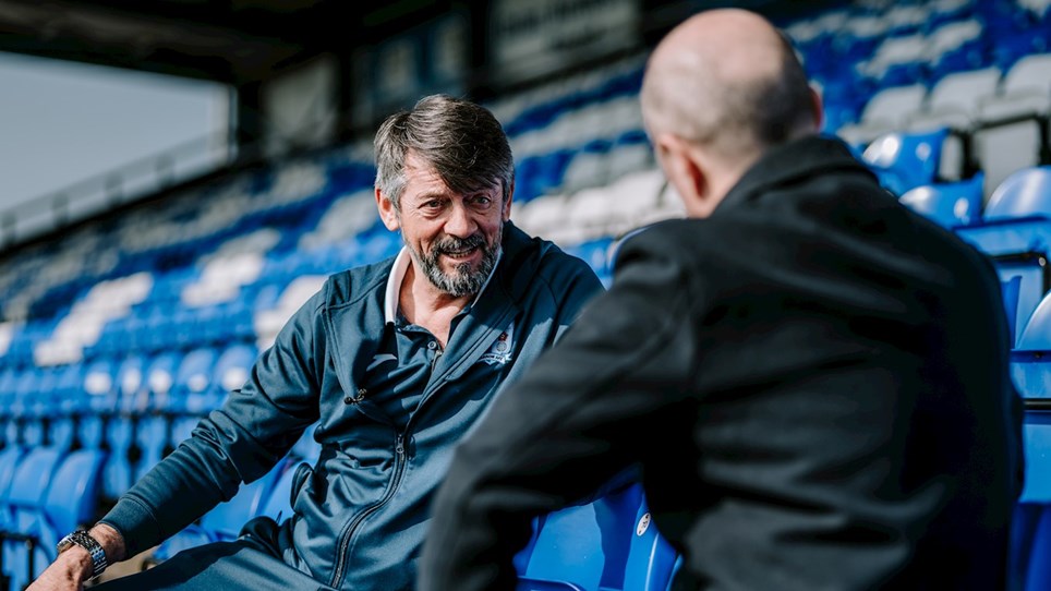 A photograph of Phil Brown being interviewed by BBC