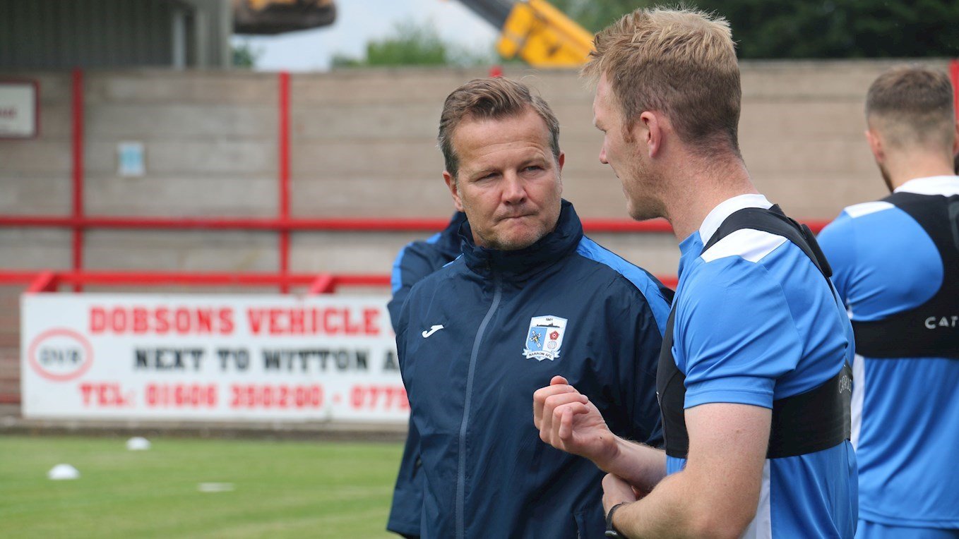 A photograph of Barrow Manager Mark Cooper and defender Mark Ellis