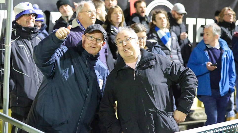 A photograph of Barrow fans at the FA Cup tie against Banbury United