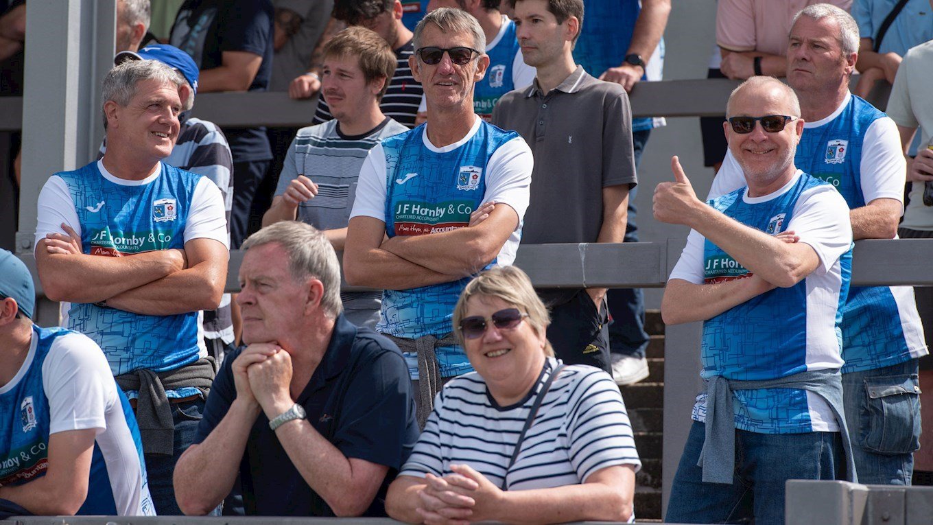 A photograph of some Barrow fans at Holker Street
