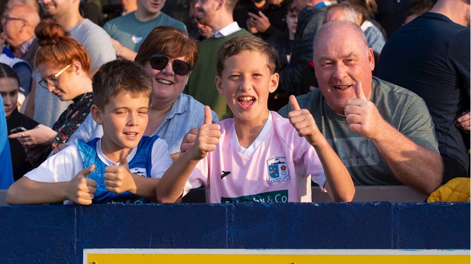 A photograph of Barrow fans at The Dunes Hotel Stadium