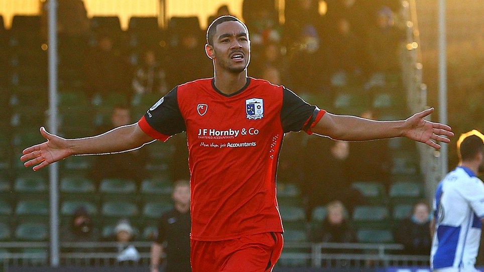 A photograph of Barrow striker Byron Harrison celebrating his second goal in the FA Cup win over Bristol Rovers in December 2016