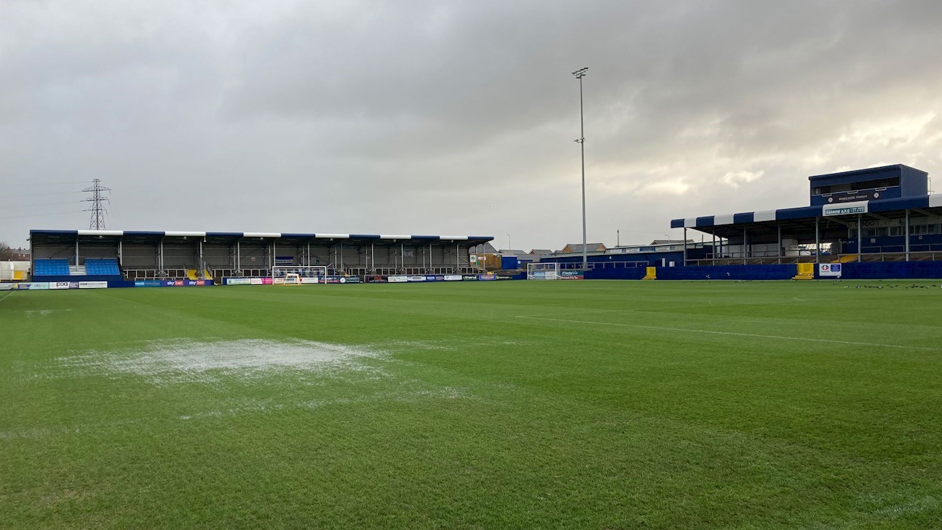 A photograph of the flooded pitch at The Dunes Hotel Stadium