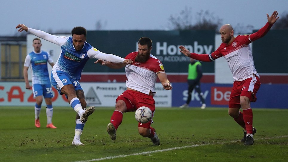 A photograph of Aaron Amadi-Holloway in action for Barrow against Stevenage