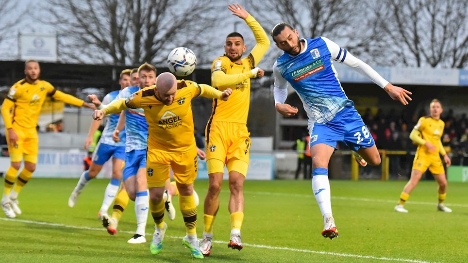 A photograph of Ollie Banks in action for Barrow at Sutton United