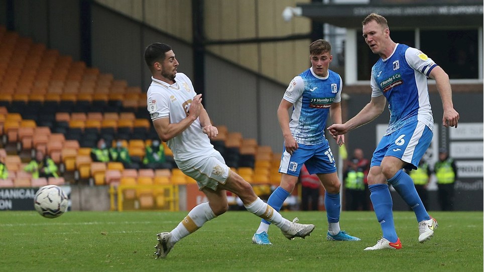 A photograph of Barrow skipper Mark Ellis in action against Port Vale