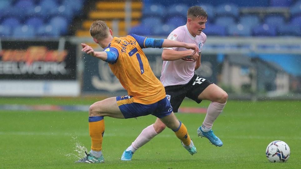 A photograph of Barrow midfielder Robbie Gotts in action against Mansfield Town