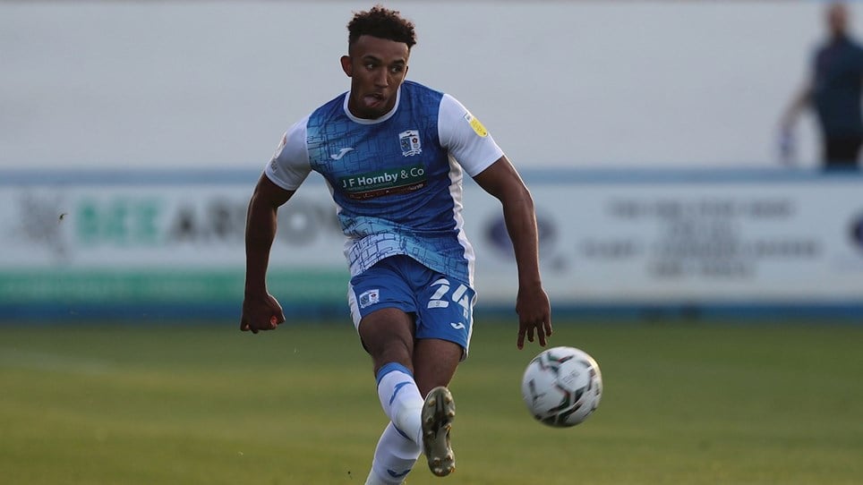 A photograph of Remeao Hutton in action for Barrow against Scunthorpe United