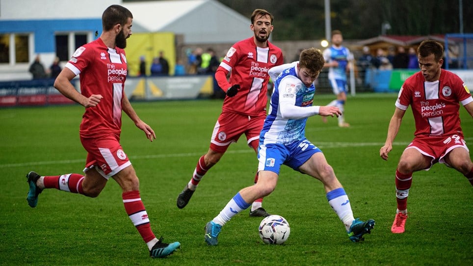A photograph of Luke James in action for Barrow against Crawley Town