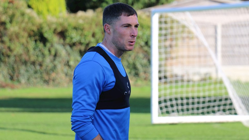 A photograph of Barrow midfielder Mike Jones in training