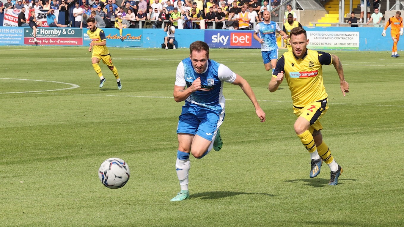 A photograph of Josh Kay in action for Barrow against Bolton Wanderers