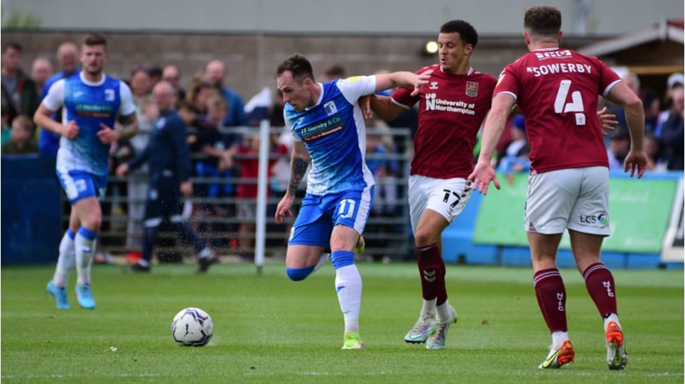 A photograph of Josh Kay in action for Barrow against Northampton Town