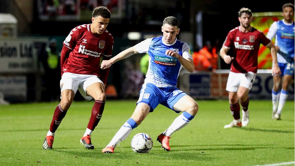 A photograph of John Rooney in action at Northampton Town for Barrow