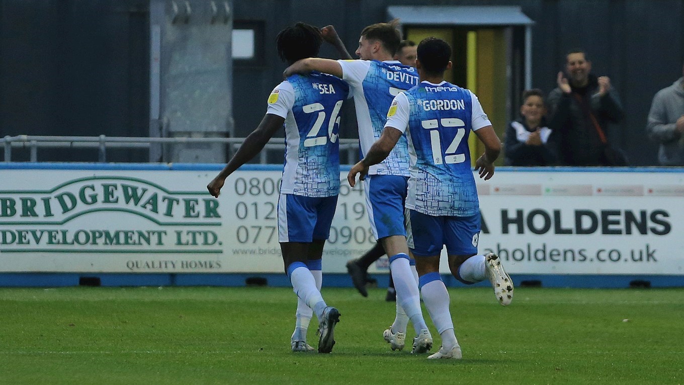 A photograph of Dimitri Sea celebrating his goal for Barrow against Scunthorpe United