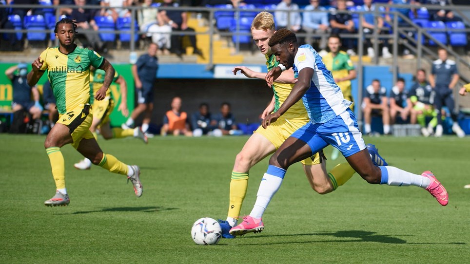 A photograph of Offrande Zanzala in action for Barrow against Bristol Rovers