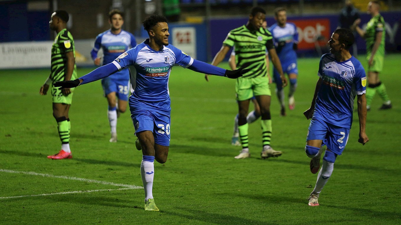 A photograph of Dior Angus celebrating his goal for Barrow against Forest Green Rovers in December 2020