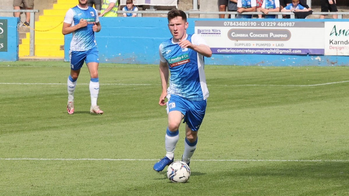A photograph of Bobby Burns playing for Barrow against Bolton Wanderers