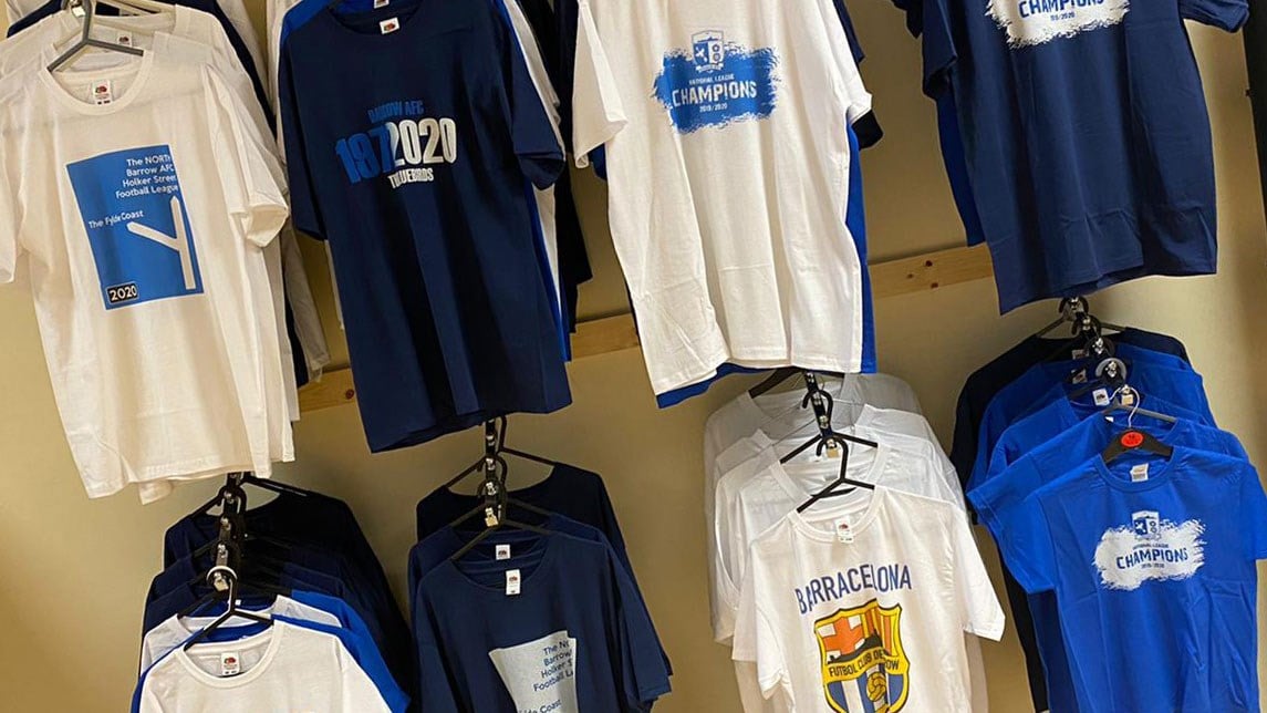 A photo of limited edition t-shirts in Club Shop